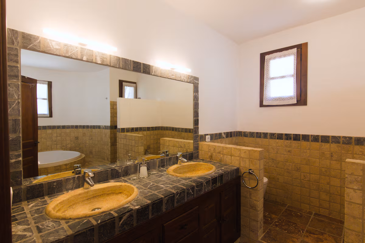 Baño, Villa Arenas